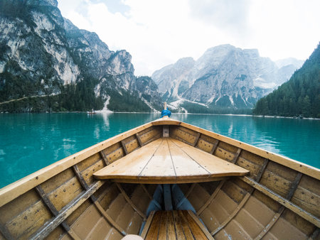 Nose of wooden boat at the alpine mountain lake. Lago di Braies, Dolomites Alps, Italy.の写真素材