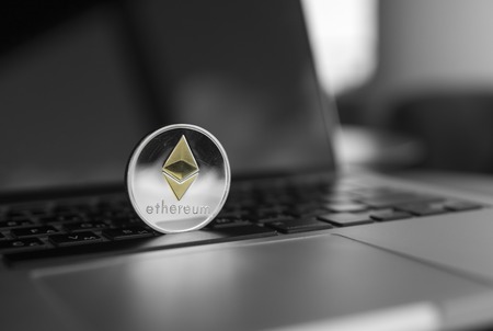 Ethereum coin symbol on laptop, future concept financial currency, crypto currency sign. Blockchain mining. Digital money and virtual cryptocurrency concept. Iinvestment. Bussiness, commercial.の写真素材