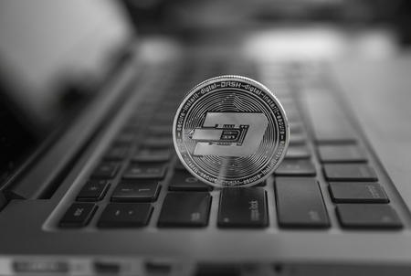 Dash coin symbol on laptop.の写真素材