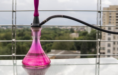 Pink hookahs on table in hookah lounge in a day.の写真素材