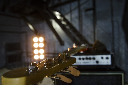 Red bass guitar close-up. Music instruments. Macro.の写真素材