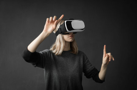 Young woman wearing virtual reality goggles headset, vr box. Connection, technology, new generation,...