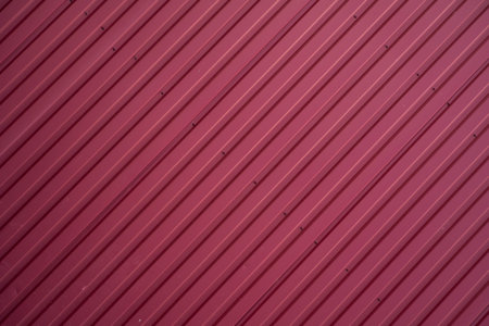 Red Corrugated metal sheet texture surface of the wall. Galvanize steel background