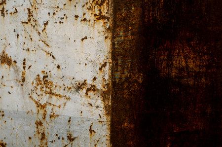 Painted metal rusted background. Metal rust texture. Erosion metal. Scratched and dirty texture on...