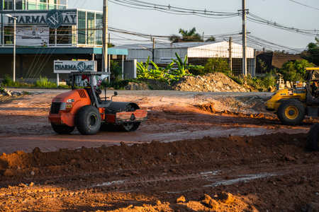 VIETNAM, HO CHI MINH - May 15, 2019: Road rollers working on the new roads construction site. Heavy...