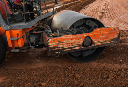 Road rollers working on the new roads construction site. Heavy duty machinery working on highway....
