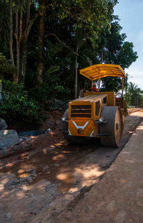 Road rollers working on the new roads construction site. Heavy duty machinery working on highway....