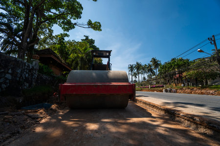 Road rollers working on the new roads construction site. Heavy duty machinery working on highway....