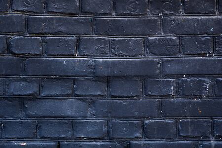 Old wall of stone bricks as a texture or backgroundの写真素材