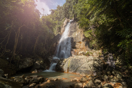 Secret tropical waterfall in jungle on a Samui island.
