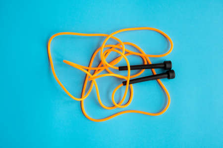 Skipping rope on blue background. Skip rope.の写真素材