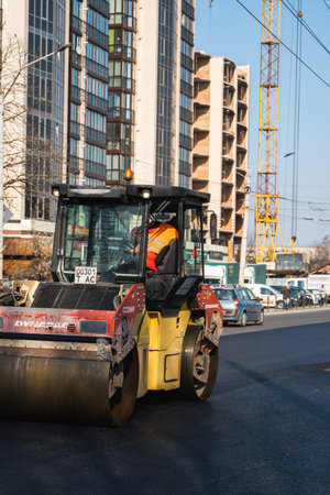 KYIV, UKRAINE - September 10, 2020: Heavy asphalt road roller with heavy vibration roller compactor...