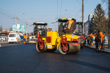 KYIV, UKRAINE - September 10, 2020: Heavy asphalt road roller with heavy vibration roller compactor...