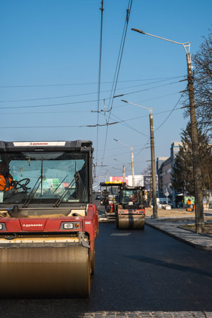KYIV, UKRAINE - September 10, 2020: Heavy asphalt road roller with heavy vibration roller compactor...