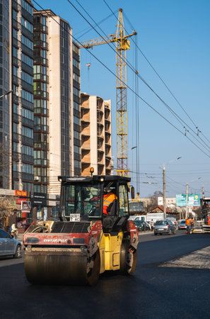 KYIV, UKRAINE - September 10, 2020: Heavy asphalt road roller with heavy vibration roller compactor...