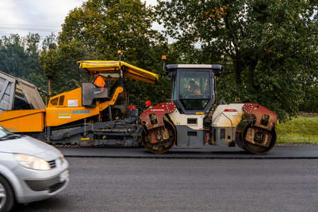 KYIV, UKRAINE - September 25, 2020: Two heavy asphalt road roller with heavy vibration roller...