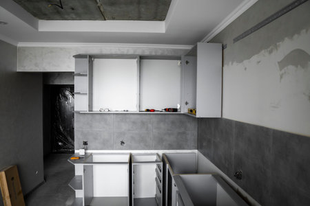 Custom kitchen cabinets installation without a furniture facades mdf. Gray modular kitchen from...