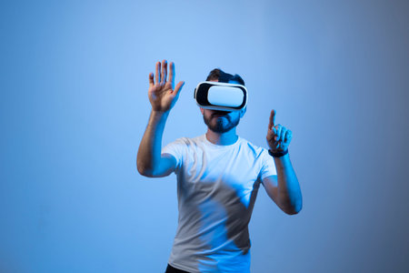 Modern architect, designer using virtual reality glasses at workplace. Designer working in augmented...