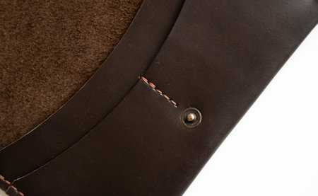 Details of open brown elegance mens wallet on a white background. Mens leather accessories.
