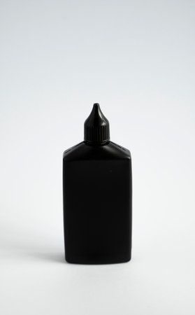Mock up unbranded black bottle of finish line dry bicycle lubricant. Bicycle care, bicycle chain care.の写真素材