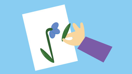 hand holding a sheet of paper with a flower on a blue background