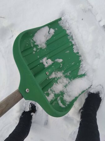 green shovel for snowの写真素材