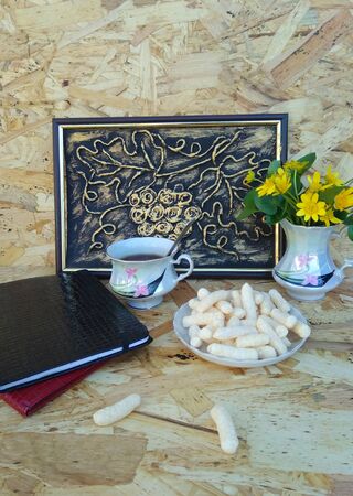 breakfast cup of tea with corn sticksの写真素材