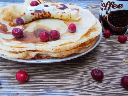 plate with pancakes on the tableの写真素材