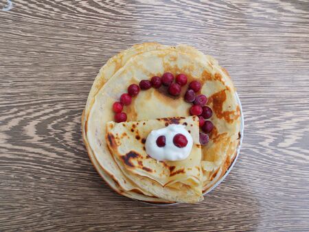 plate with pancakes on the tableの写真素材