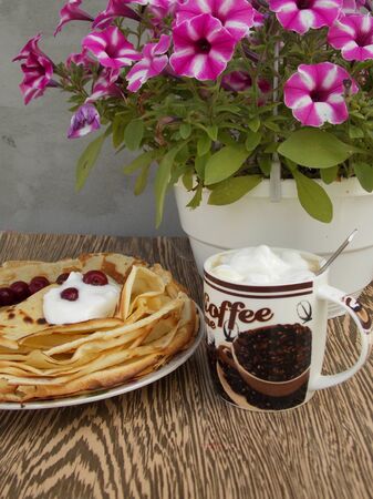 pancake breakfast on wooden backgroundの写真素材
