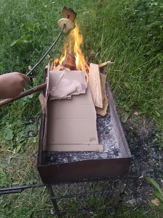mongal with firewood and bread in natureの写真素材