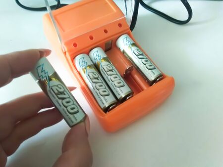 batteries with batteries on a white backgroundの写真素材