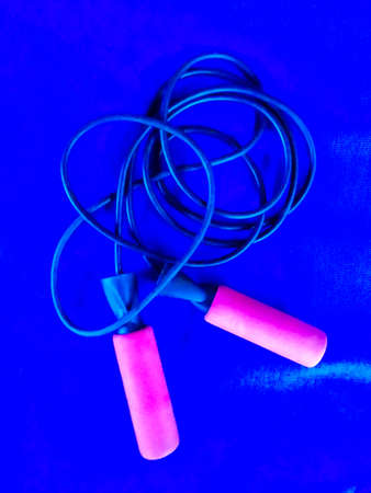 skipping rope on blue backgroundの写真素材