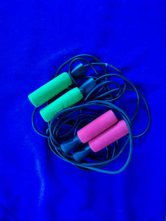 skipping rope on blue backgroundの写真素材