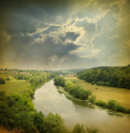 Landscape - meadow,Grunge blue sky and riverの写真素材