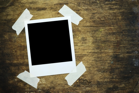   Blank photo on brown wood texture の写真素材