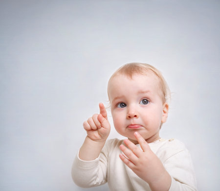 bright picture of adorable baby boyの写真素材