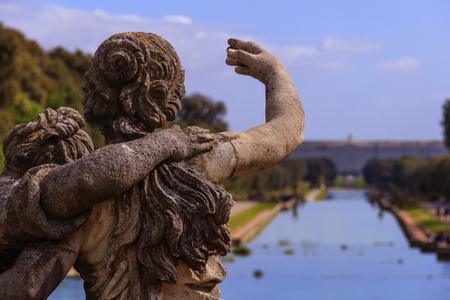 The Royal Palace of Caserta: the garden. Italy (Campania) .Detail of a sculpture.View of the northern facade from the middle of the Garden.のeditorial素材