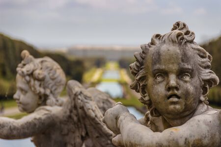 The Royal Palace of Caserta: the garden. Italy (Campania).Sculpture: angel's face.Detail of a sculpture.View of the northern facade from the middle of the Garden.のeditorial素材