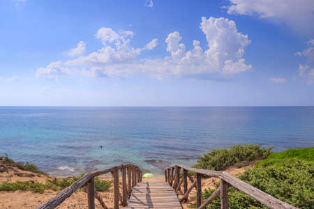 Discovering Italy: one of the most beautiful Italian beaches in Puglia is located in Campomarino Dune Park. The protected area extends along the entire coast of the town of Maruggio.の写真素材