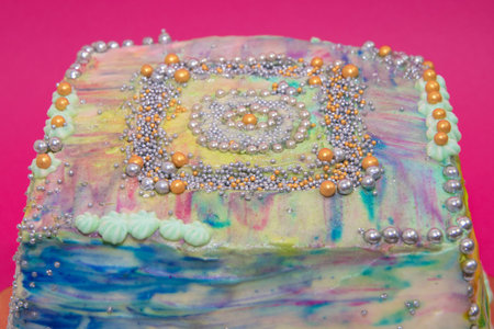 beautiful colored cake on a crimsonの写真素材