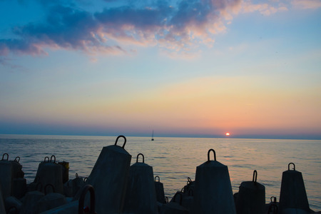 very colorful sunset on the background of the sea with a beautiful skyの写真素材