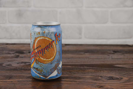 A vintage aluminum can of Summer ice soft drink against the brick wallのeditorial素材
