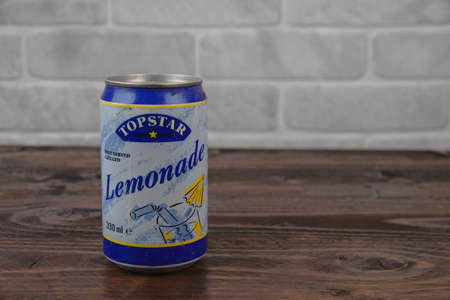 A vintage aluminum can of TopStar soft drink against the brick wallのeditorial素材