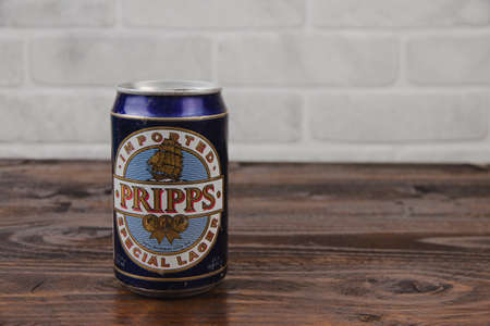 A vintage aluminium can of Pripps beer against the brick wallのeditorial素材