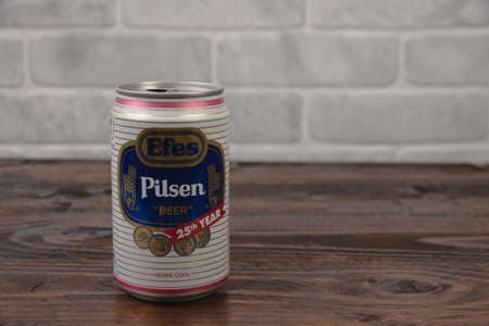 A vintage aluminium can of Efes beer against the brick wallのeditorial素材