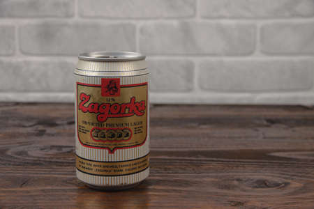 A vintage aluminium can of Zagorka Bulgarian lager beer against the brick wallのeditorial素材