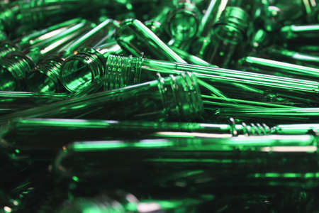An abstract background of green pet plastic preformsの写真素材
