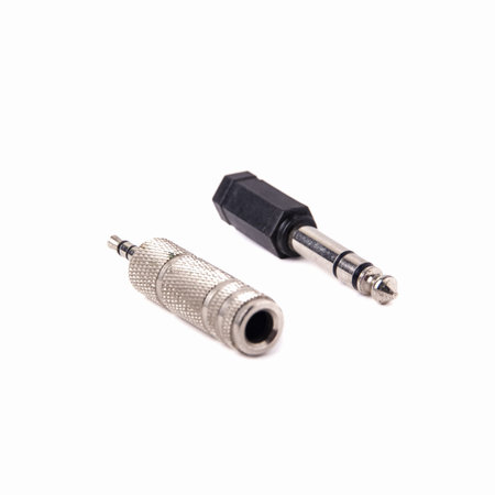 Plastic and metal audio Jack-to-minijack and minijack-to-Jack adapter isolated on a white backgroundの写真素材