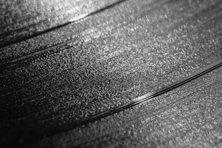 The texture of a vinyl record in macro photography. Selective focus. Background imageの写真素材